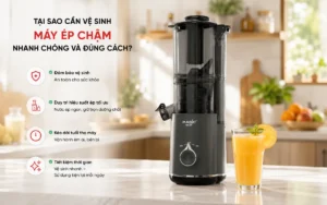 Máy ép chậm Magic Eco sạch sẽ, sáng bóng bên cạnh ly nước ép tươi ngon, thể hiện tầm quan trọng của vệ sinh máy ép chậm.